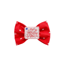 Load image into Gallery viewer, Red and white stars bow tie with with embroidered Happy Birthday America feltie center made with Alligator hair clip, over the collar or elastic headband (2 sizes available)
