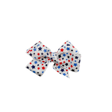 Load image into Gallery viewer, Red white and blue stars 1.5 in Grosgrain Hair bow Made with an Alligator Hair clip