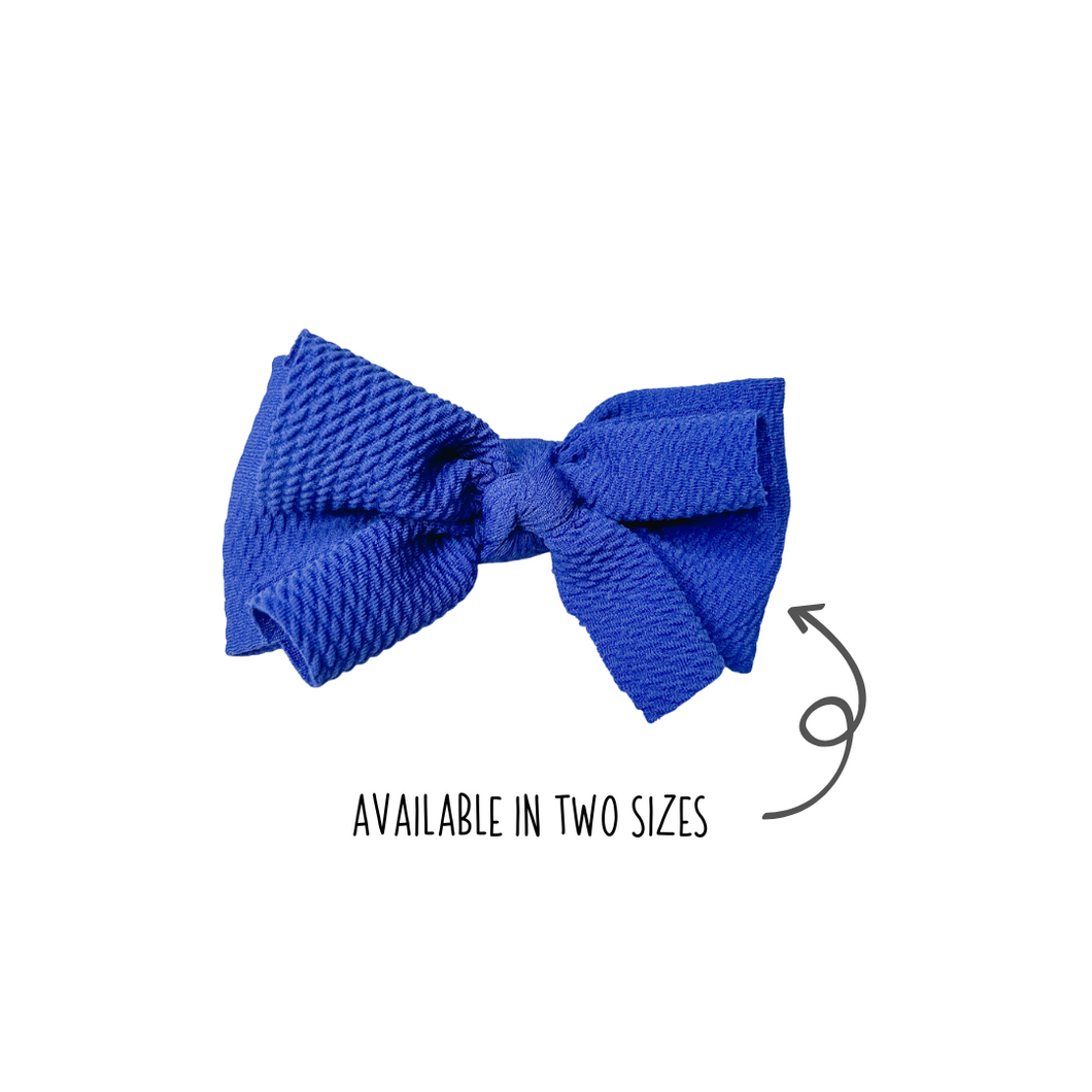 Layered waffle bows in Royal Blue made with Alligator hair clip, over the collar or elastic headband