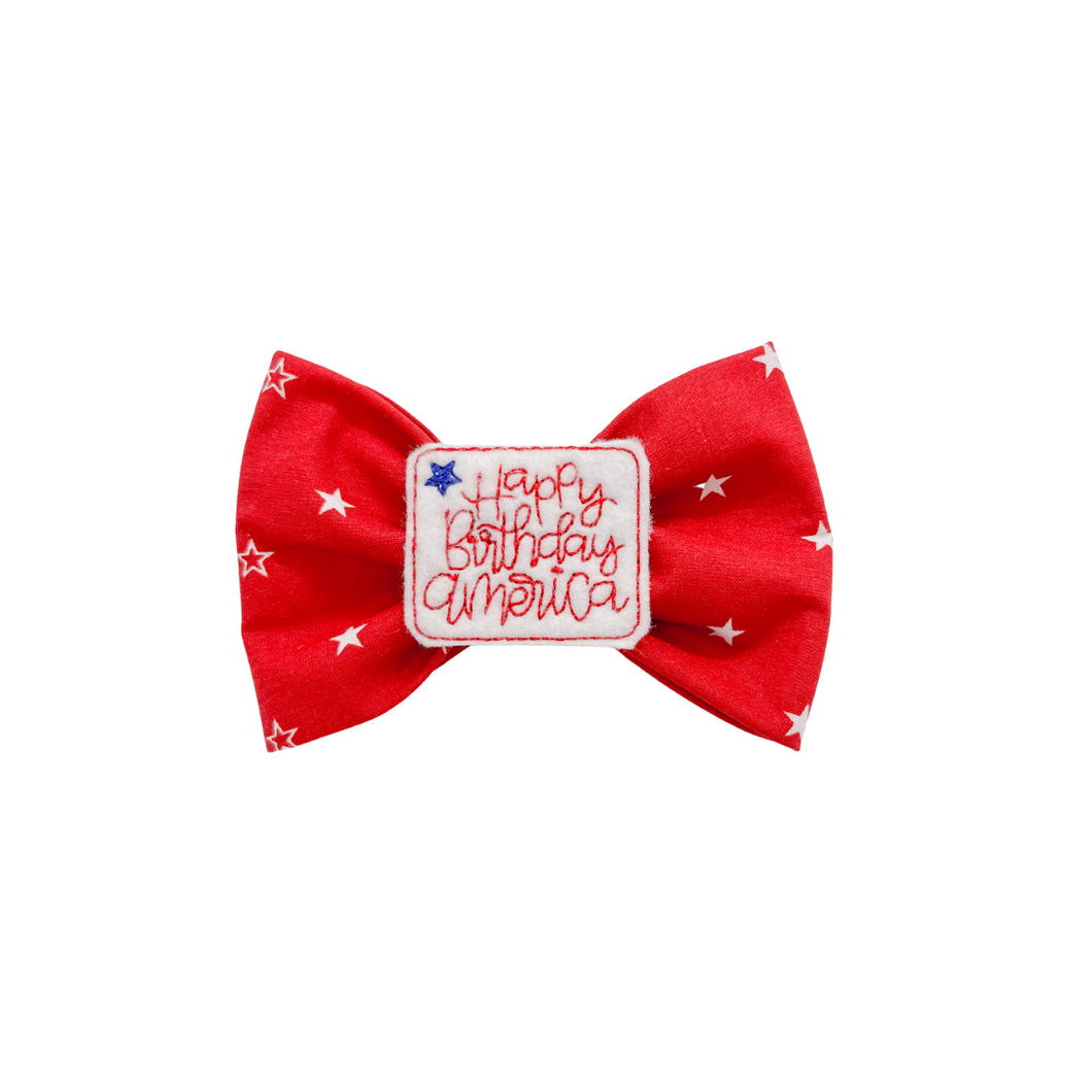 Red and white stars bow tie with with embroidered Happy Birthday America feltie center made with Alligator hair clip, over the collar or elastic headband (2 sizes available)