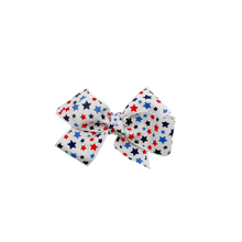 Load image into Gallery viewer, Red white and blue stars 1.5 in Grosgrain Hair bow Made with an Alligator Hair clip or elastic headband
