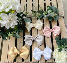 Load image into Gallery viewer, Ivory 2 in Double Faced Satin Hair bow Made with an alligator Hair clip or elastic headband
