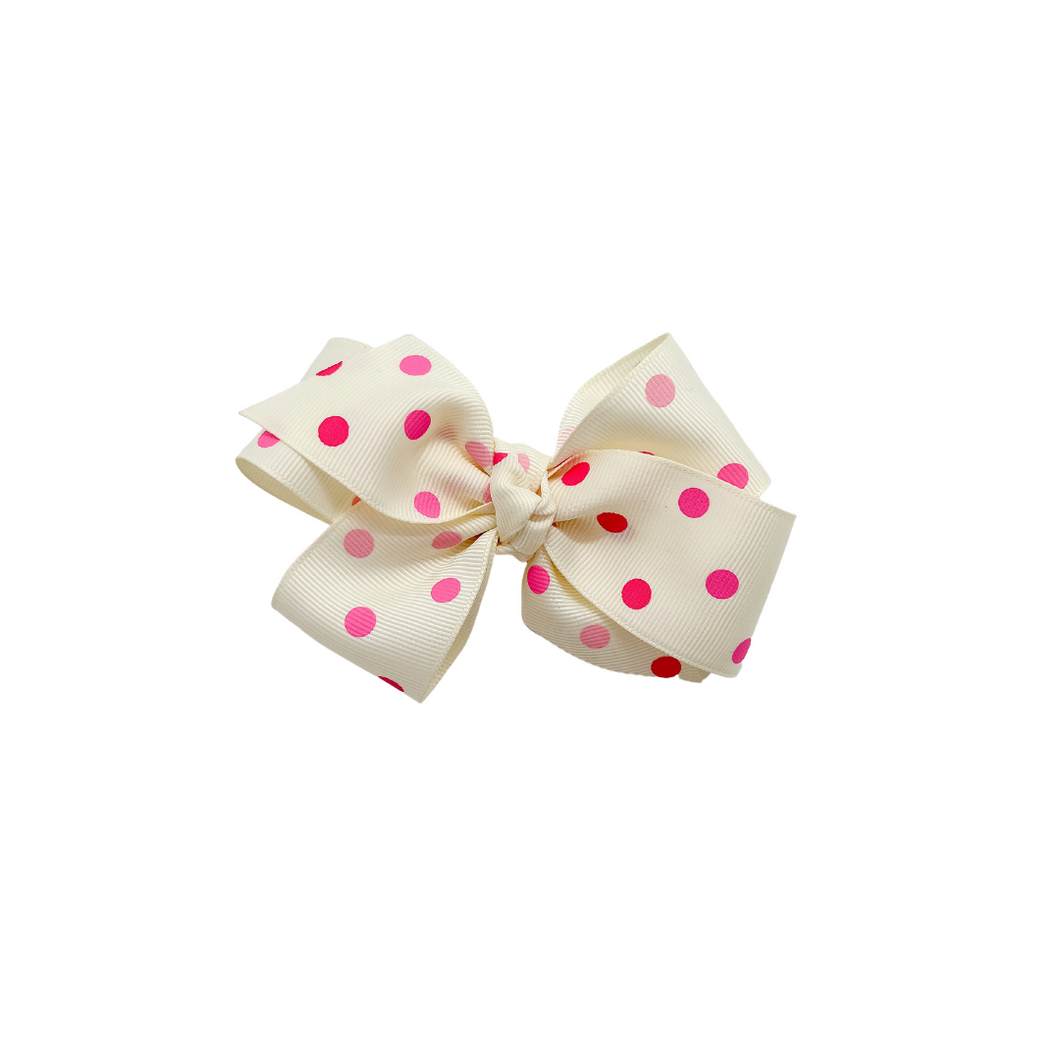 Pale yellow with pink polka dots 1.5in Grosgrain Hairbow  Made with an alligator Hairclip or elastic headband
