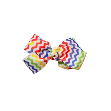 Load image into Gallery viewer, Rainbow Chevron 1.5in Grosgrain Hair bow  Made with an alligator Hair clip or elastic headband

