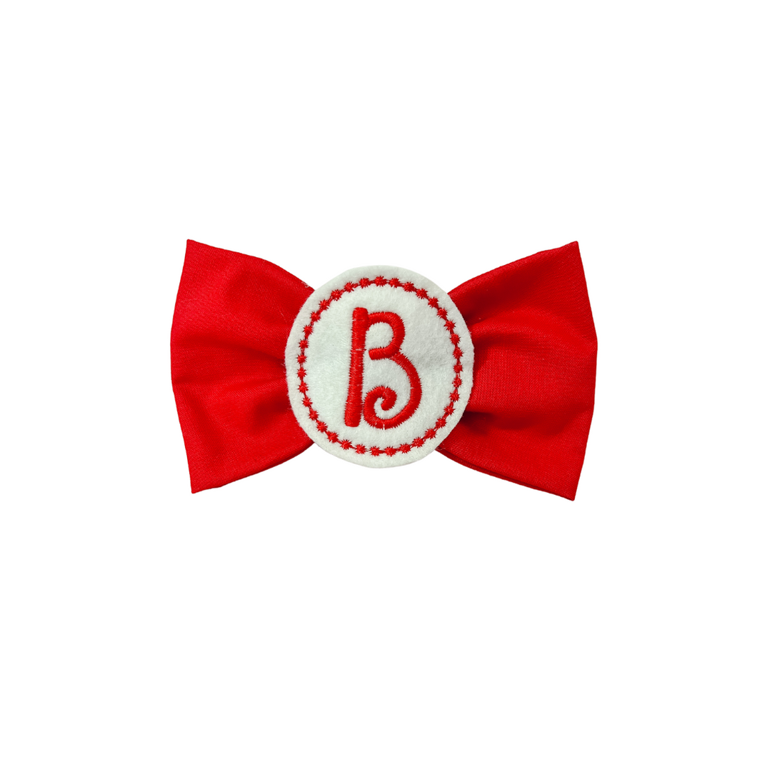Red Embroidered Circle Letter Bow Tie made with Alligator hair clip, over the collar or elastic headband