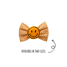 Load image into Gallery viewer, Yellow check Bow Tie with embroidered feltie Smiley Face center made with Alligator hair clip, over the collar or elastic headband (2 sizes available)
