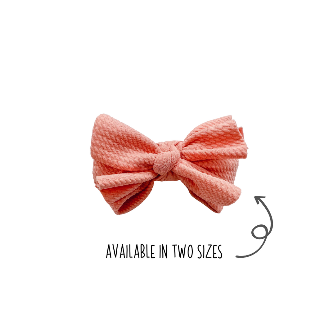 Layered waffle bows in Peach made with Alligator hair clip, over the collar or elastic headband
