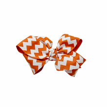 Load image into Gallery viewer, Orange Striped 1.5 in Grosgrain Hair bow  Made with an  Alligator Hair clip or elastic headband
